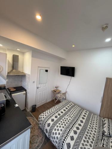 Μια τηλεόραση ή/και κέντρο ψυχαγωγίας στο Comfort Studio In Wembley