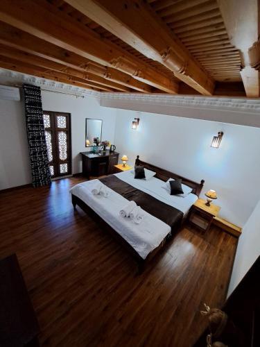 Ένα ή περισσότερα κρεβάτια σε δωμάτιο στο Golden Minaret Terrace old city view unreal discoun,t