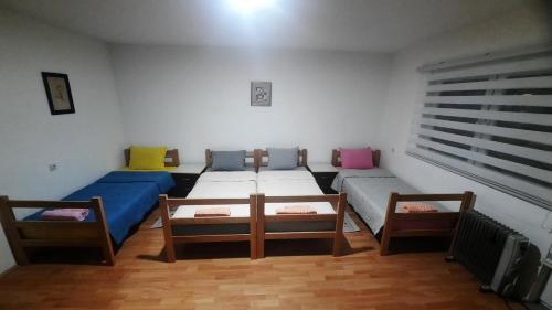 Ένα ή περισσότερα κρεβάτια σε δωμάτιο στο Potok