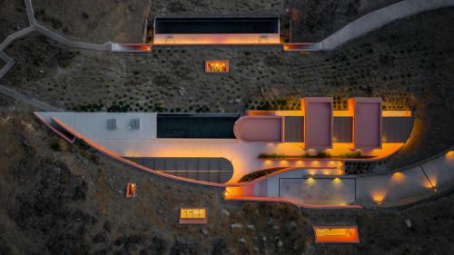 an overhead view of a building at night at Olen Syros in Megas Yialos-Nites