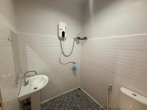 a bathroom with a shower and a sink at Diamond House in Srithanu in Srithanu