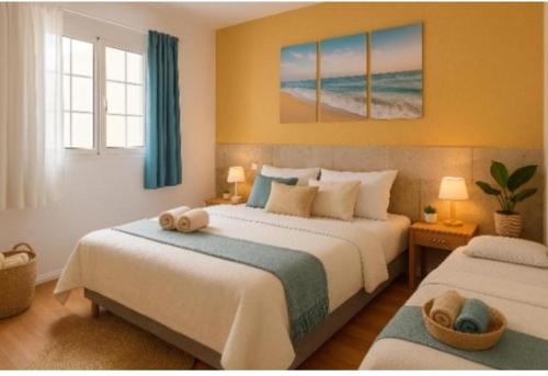 Postel nebo postele na pokoji v ubytování Gran Canaria Las Palmas Apartment