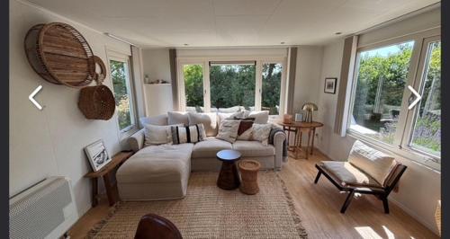 Χώρος καθιστικού στο gezellige chalet cadzand Zeeland