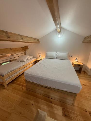 a bedroom with two beds in a room at Cozy Lac - Puyvalador in Puyvalador