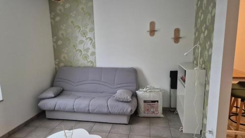 Een zitgedeelte bij Studio La Pause d'un Soir