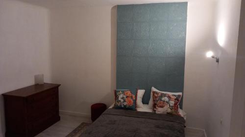 En eller flere senge i et værelse på Résidence Scarlette