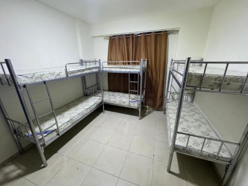 Llit o llits en una habitació de RA daily hostel