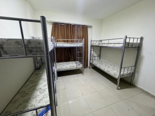 Llit o llits en una habitació de RA daily hostel