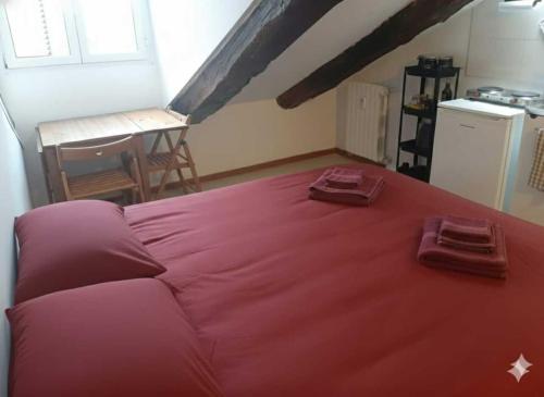 Ένα ή περισσότερα κρεβάτια σε δωμάτιο στο Elohim Center