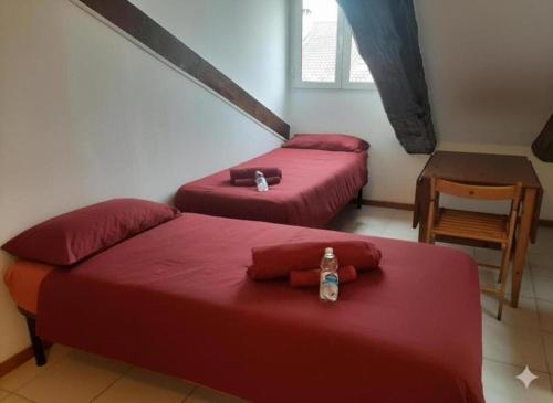 Ένα ή περισσότερα κρεβάτια σε δωμάτιο στο Elohim Center