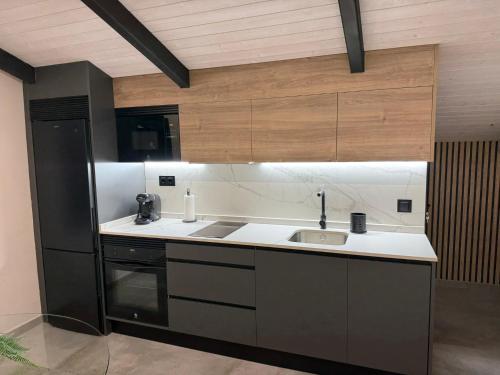 Η κουζίνα ή μικρή κουζίνα στο El Helecho de Gredos