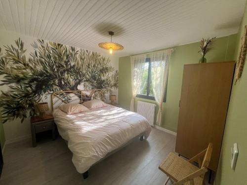 Ένα ή περισσότερα κρεβάτια σε δωμάτιο στο Maison de Rêve avec Piscine