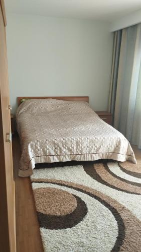 Ένα ή περισσότερα κρεβάτια σε δωμάτιο στο Calin