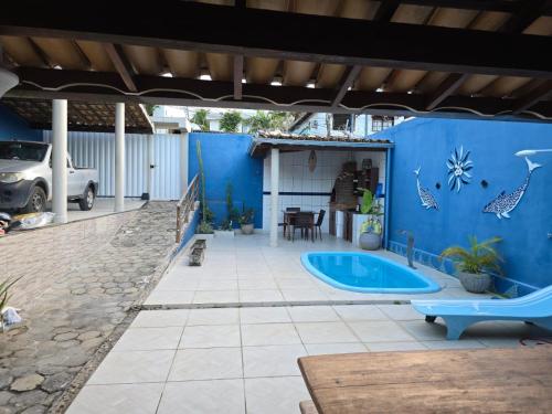 Πισίνα στο ή κοντά στο Suítes Arraial 300m do Centro