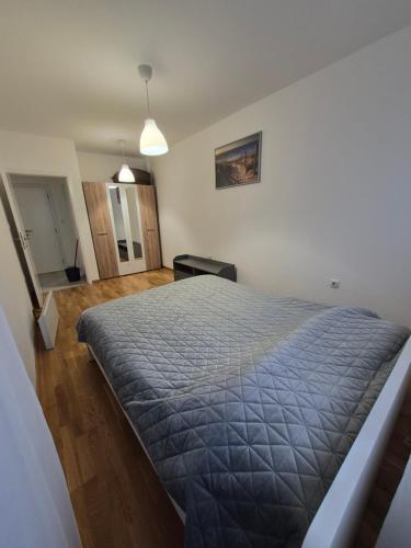 Postel nebo postele na pokoji v ubytování Stan