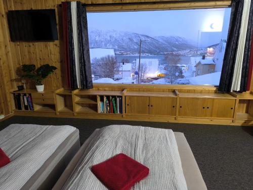 Ένα ή περισσότερα κρεβάτια σε δωμάτιο στο Central Apartament