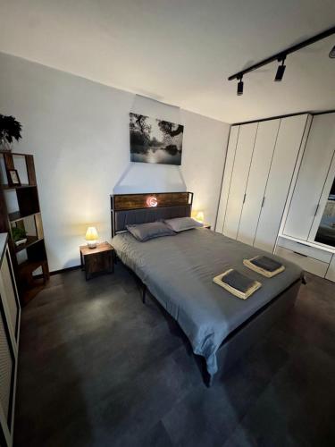 Ένα ή περισσότερα κρεβάτια σε δωμάτιο στο Cazare Craiova