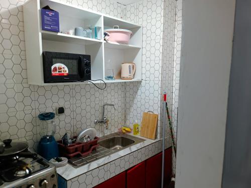 Køkken eller tekøkken på Vinofa Résidence