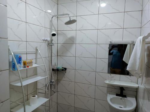 Et badeværelse på Vinofa Résidence