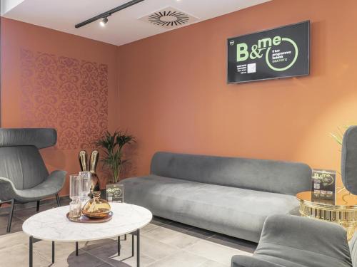 Χώρος καθιστικού στο B&B HOTEL Prato City Center