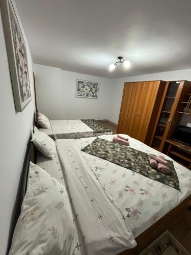 Ένα ή περισσότερα κρεβάτια σε δωμάτιο στο Apartament Comfort