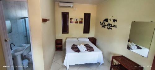 Postel nebo postele na pokoji v ubytování Pousada Pôr do Sol