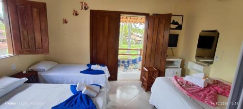 TV a/nebo společenská místnost v ubytování Pousada Pôr do Sol