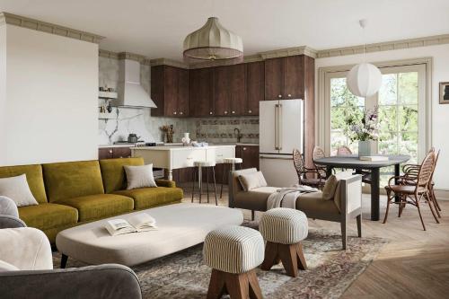 ein Wohnzimmer mit Sofa und Tisch in der Unterkunft Maison Foxglove - Petite Acres Chateau in New Buffalo