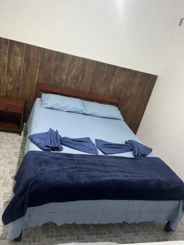 Ένα ή περισσότερα κρεβάτια σε δωμάτιο στο Pousada Canoa Quebrada Ubatuba