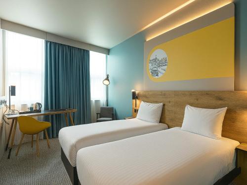 Ένα ή περισσότερα κρεβάτια σε δωμάτιο στο B&B HOTEL Ipswich