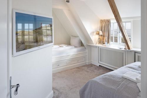 Ένα ή περισσότερα κρεβάτια σε δωμάτιο στο Seaside