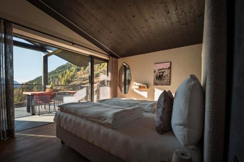 Ένα ή περισσότερα κρεβάτια σε δωμάτιο στο Bergchalet a n d e r s