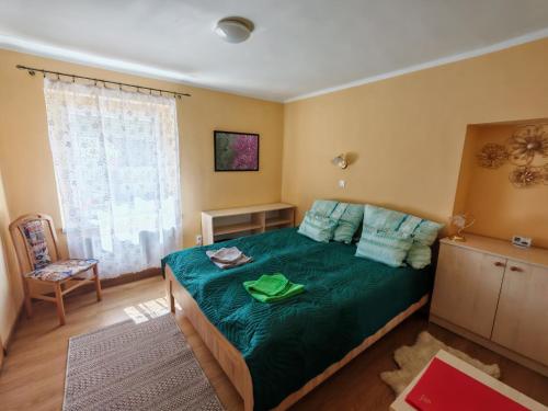 Ένα ή περισσότερα κρεβάτια σε δωμάτιο στο St. Rita Guesthouse