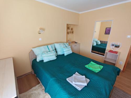 Ένα ή περισσότερα κρεβάτια σε δωμάτιο στο St. Rita Guesthouse