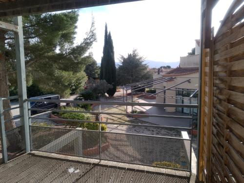 a balcony with a view of a garden at ANTIQUA ROMA - via temporis CXIV in Alénya