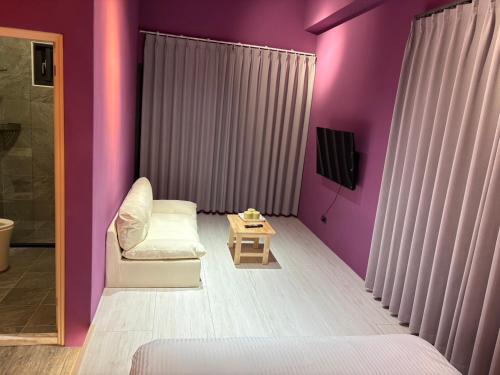 Ein Bett oder Betten in einem Zimmer der Unterkunft 陌野輕旅民宿