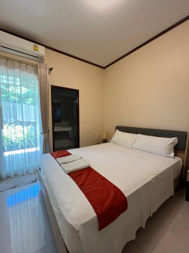 Ένα ή περισσότερα κρεβάτια σε δωμάτιο στο Project 17