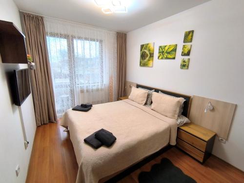 Postel nebo postele na pokoji v ubytování VIP Apartment Belvedere Club