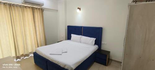 Giường trong phòng chung tại Acron Seawinds Wave 2bhk Baga