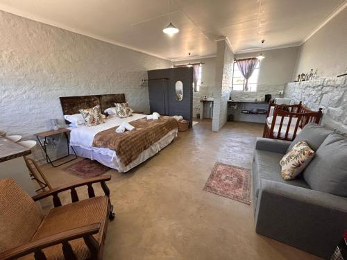 Ένα ή περισσότερα κρεβάτια σε δωμάτιο στο Carlton Heights Guesthouse