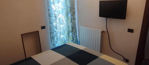 TV a/nebo společenská místnost v ubytování Casa Piccole Marmotte