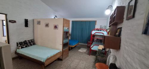 En eller flere senge i et værelse på Cabañas Adolfo y María