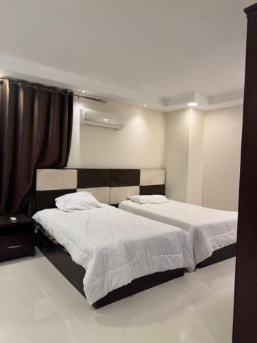 Φωτογραφία από το άλμπουμ του شقة فوق السحاب στο Κάιρο