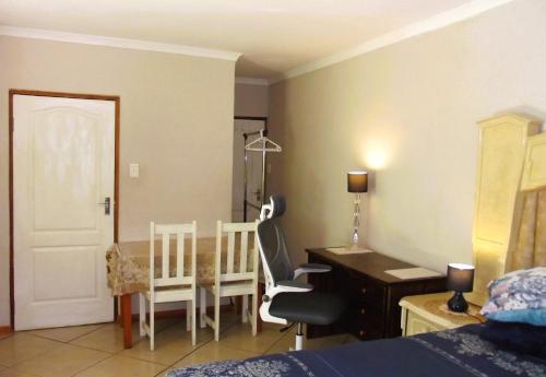 Ένα ή περισσότερα κρεβάτια σε δωμάτιο στο Garden Wing