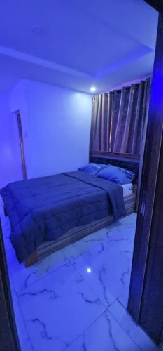 Ένα ή περισσότερα κρεβάτια σε δωμάτιο στο Subscribe to Famous Channel