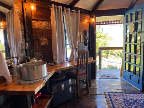 Фотография из галереи OctoCabana na montanha - rustica e luxuosa I в городе Урубиси