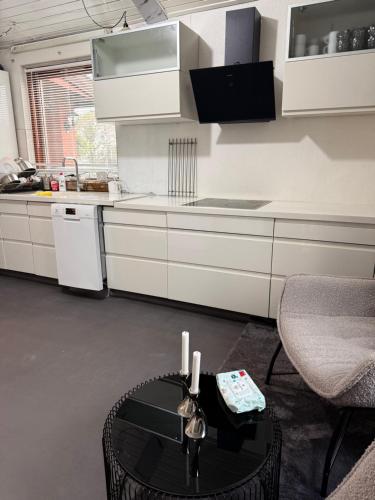 Kuchyň nebo kuchyňský kout v ubytování Cosy home in Rødovre