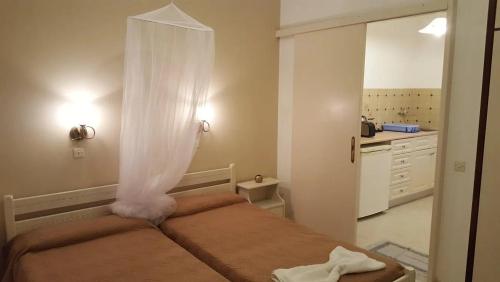 Ένα μπάνιο στο Arillas Dream Studios