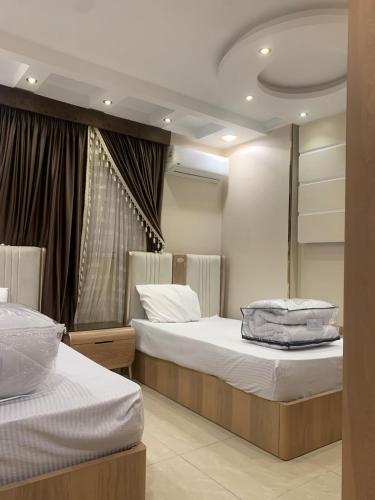 Ένα ή περισσότερα κρεβάτια σε δωμάτιο στο Strategically located apartment