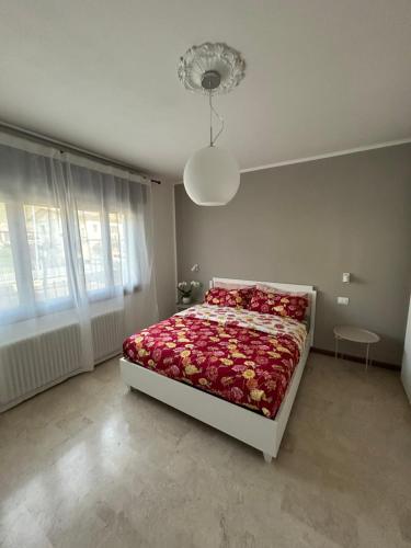 Ένα ή περισσότερα κρεβάτια σε δωμάτιο στο AlMi House - Colline del Prosecco